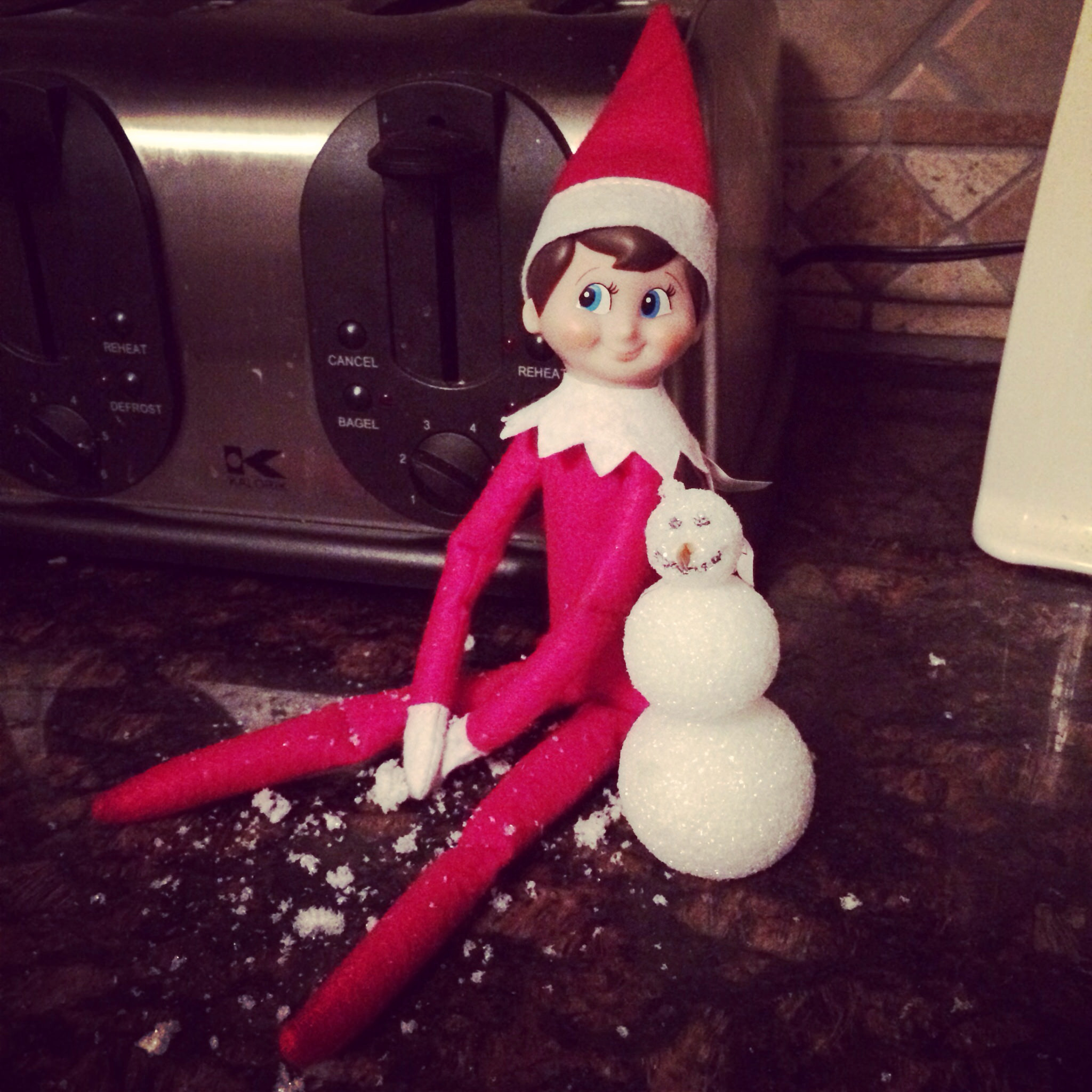 elf on the shelf making snowman 